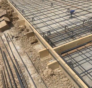 Rebar and concrete form work for slab construction