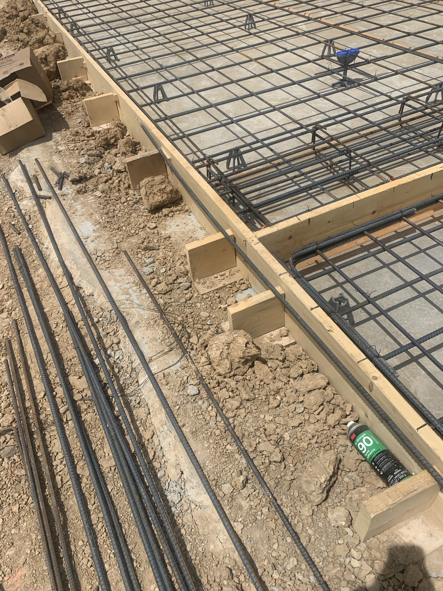 Rebar and concrete form work for slab construction