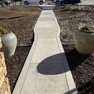 Finished concrete walkway installation
